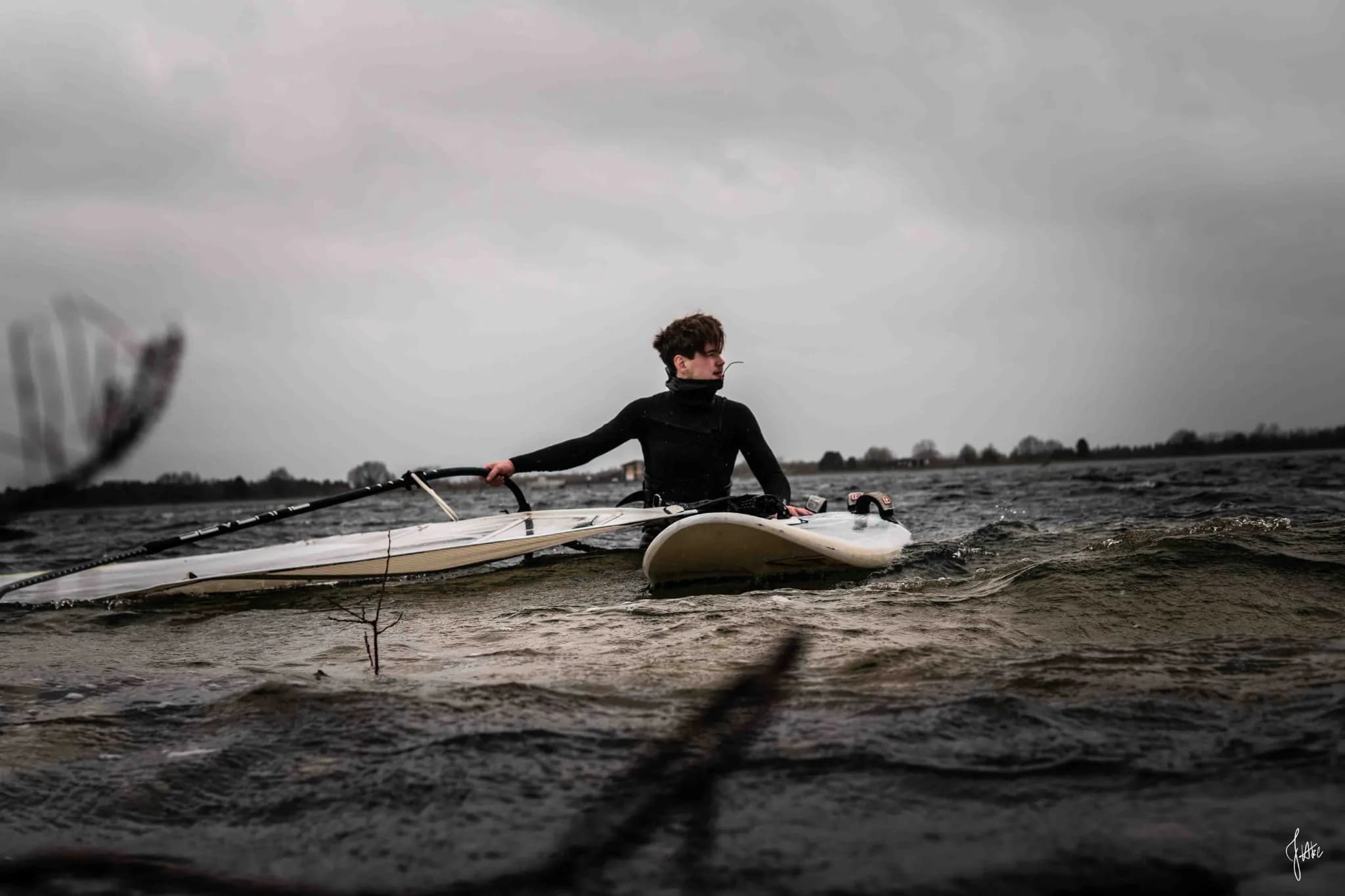 Traveler standing at a waterfall